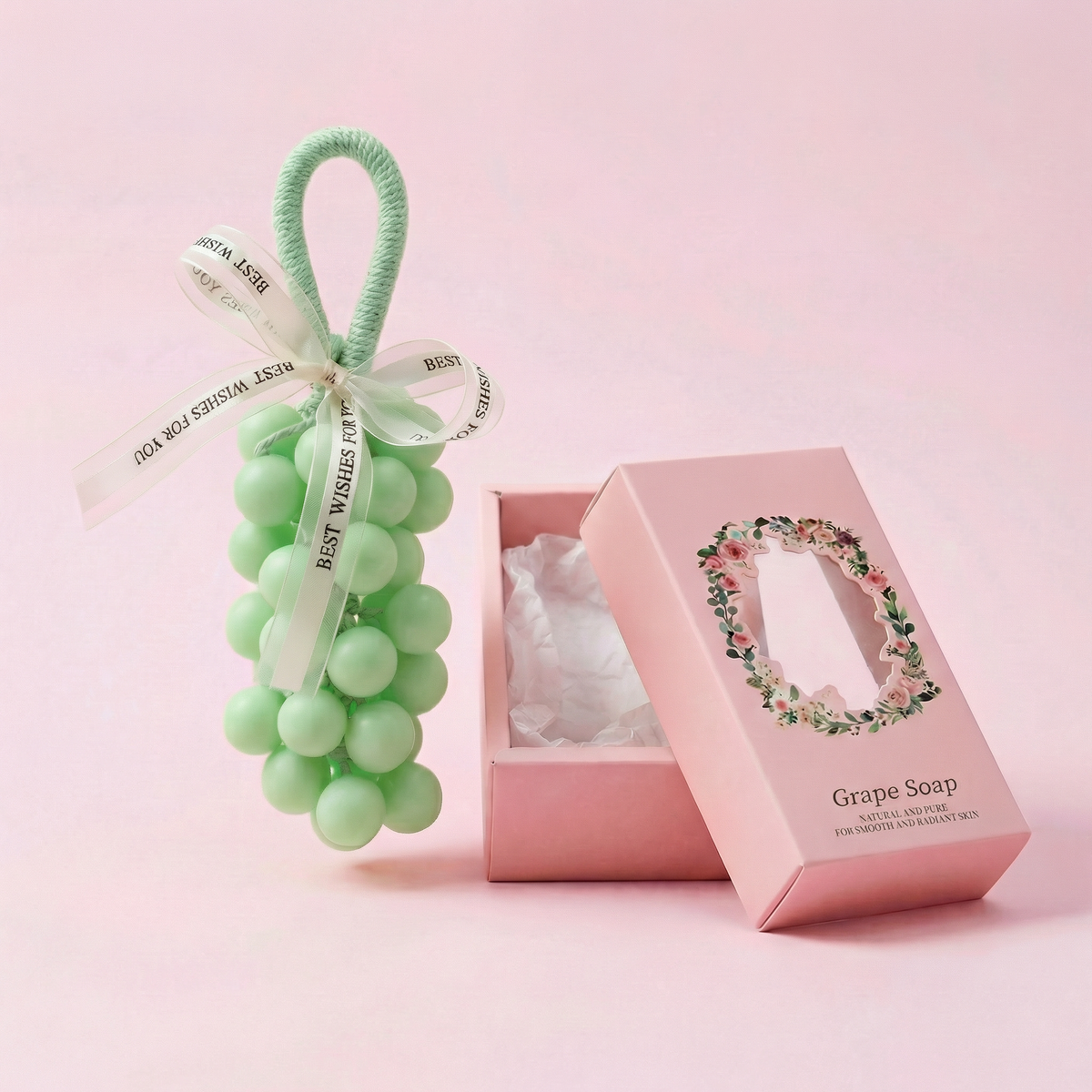 Green grape-shaped hanging soap with pink presentation box